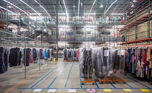 ABCO Systems installed multi-level pick modules featuring Interlake Mecalux rack specifically designed for hanging garments